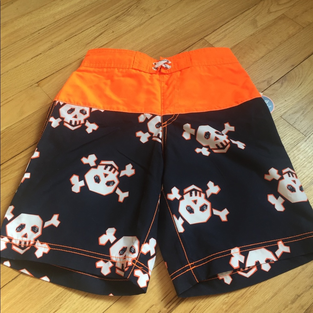 NWT boy’s swim trunks & backpack set